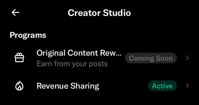 A screenshot of a 'Creator Studio' interface in dark mode, showing a 'Programs' section with 'Original Content Rew...' marked 'Coming Soon' and 'Revenue Sharing' marked 'Active'.