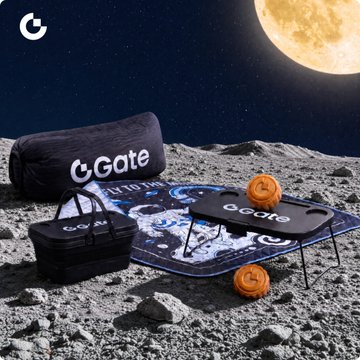 An advertisement showcasing GoGate branded camping/outdoor products including a sleeping bag, mattress, cooler bag, and folding table set up on a lunar surface with the moon in the background.