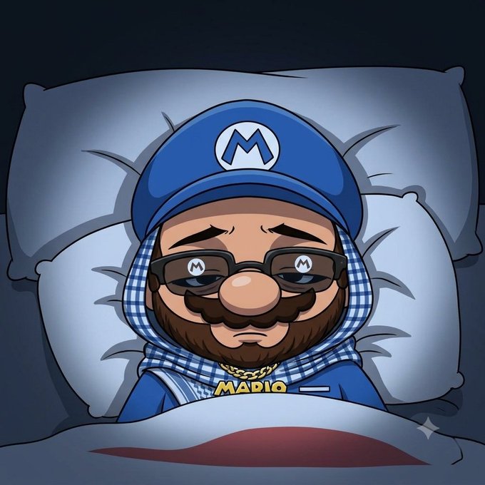 A cartoon NFT character wearing a blue Mario hat and hoodie with an 'M' logo, glasses with matching logos, and a gold chain reading 'MARIO', lying in bed with a tired expression.