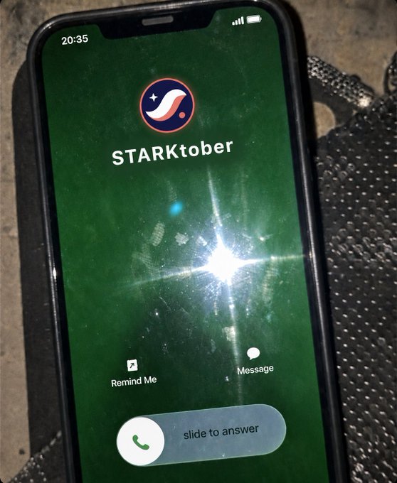 A smartphone displays an incoming call from "STARKtober" against a starry green background, featuring a "slide to answer" prompt. The image visually reinforces the post's message to "answer the call" for Starknet ($STRK) during STARKtober, using the phone call metaphor to promote engagement with the project.