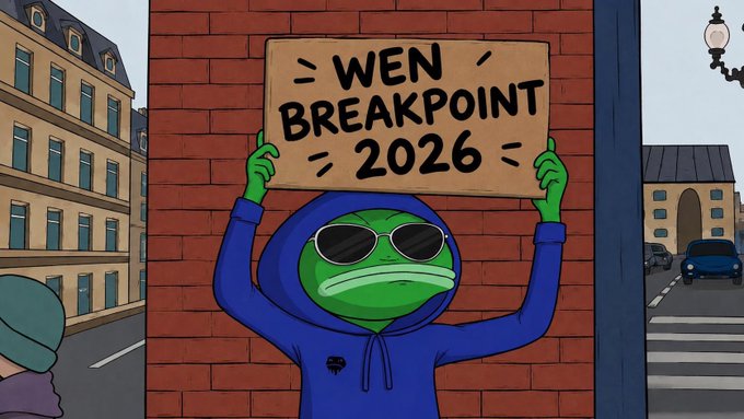 A cartoon Pepe the Frog character wearing sunglasses and a blue hoodie holds up a cardboard sign reading 'WEN BREAKPOINT 2026' against a brick wall in a city street scene.