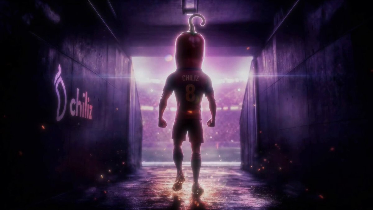 The image features a man wearing a soccer jersey with the number 8 on it, walking through an entrance that has a large pumpkin hanging from the ceiling. The background of the image shows a stadium filled with fans, indicating that this scene takes place at a soccer match or event. The post also mentions PSG and Arsenal meeting in the Champions League Final on May 30th, which is a significant date for soccer events.