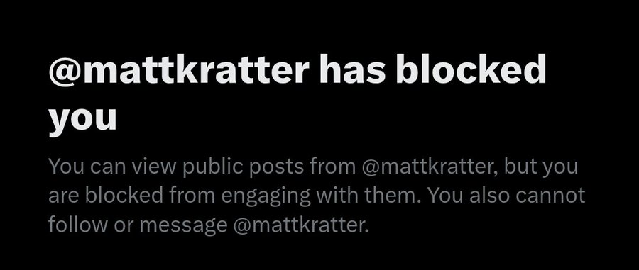 A dark-themed screenshot showing that "@mattkratter has blocked you," with an explanation that the user can view public posts but cannot engage, follow, or message @mattkratter. The accompanying caption "Was it something I said?" humorously reflects the speaker's surprise and hurt at being blocked by @mattkratter.