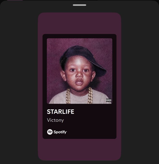 A Spotify playing screen displayed on a phone showing the song 'STARLIFE' by Victony, featuring album art of a young child wearing a sideways cap and a gold chain.