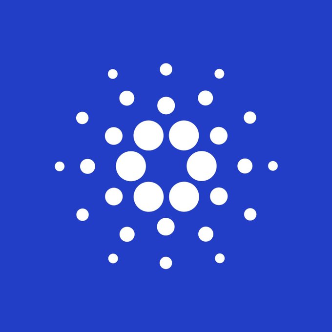 A blue background featuring the white Cardano (ADA) logo—a circular arrangement of dots—symbolizing the blockchain network referenced in the post's warning about Cardano native tokens and the need for fundamental business value over hype.
