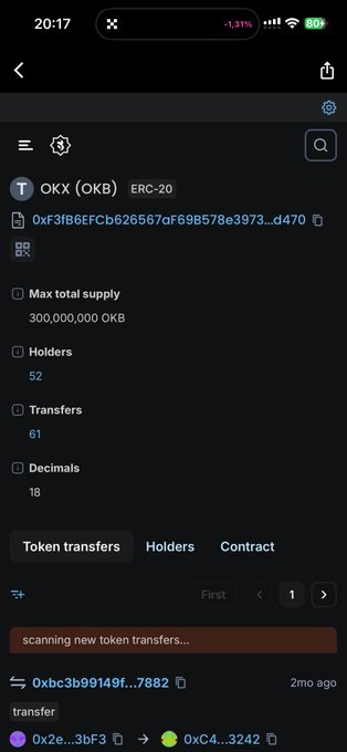 A mobile phone screenshot showing OKX token information for OKX (OKB) ERC-20 token, displaying a max total supply of 300,000,000 OKB, 52 holders, and 61 transfers.