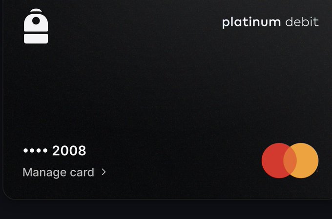 A sleek black platinum debit card displayed on a dark background, featuring an Overstock logo, the text "platinum debit," "Manage card," the last four digits "2008," and the Mastercard logo. The image relates to the post by showcasing the Backpack card as a versatile all-in-one financial tool for managing stocks, crypto, banking, and card needs.