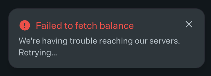A dark error notification banner displays a red warning icon alongside the message "Failed to fetch balance," with subtext reading "We're having trouble reaching our servers. Retrying..." and a close button in the top right. The image relates to the post by illustrating that the speaker is no longer able to access their funds, tying into the end of the @world_xyz campaign and the loss of "stimmy's."