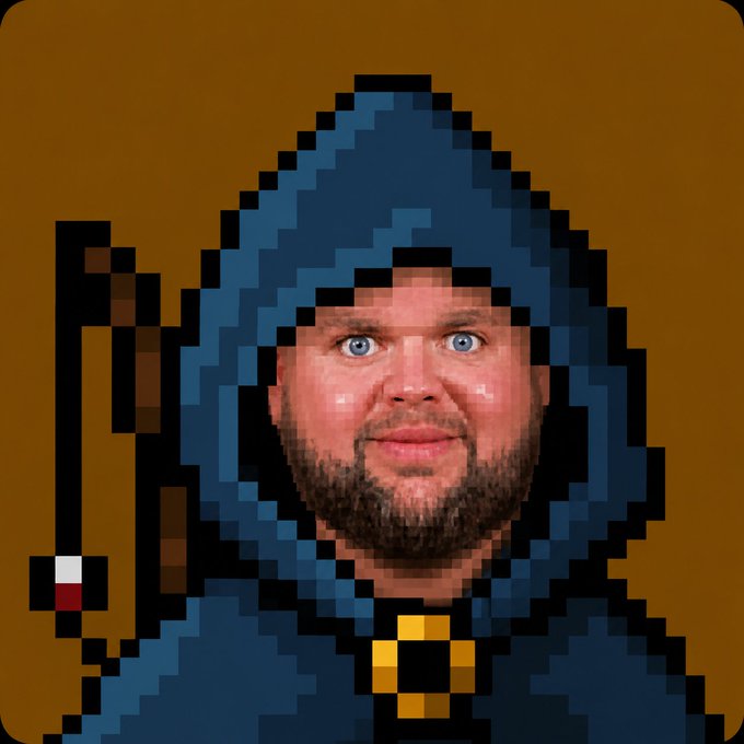 A pixel art style portrait of a bearded man wearing a blue hooded cloak with a gold buckle, set against a brown background.