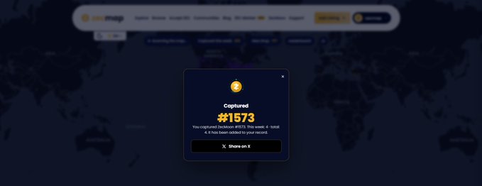 A screenshot of a coinmap website popup celebrating a captured Bitcoin, showing '#1573' with a note that '4.8 has been added to your record'.