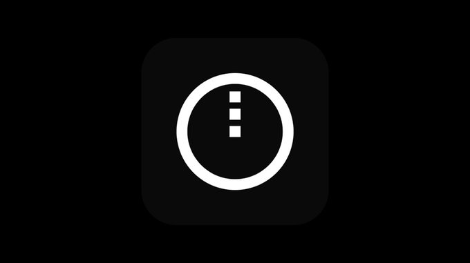 A minimalist black icon featuring a white circle containing three small squares arranged vertically, resembling a stylized information or menu symbol.