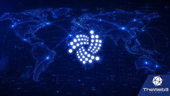 A blue-themed digital graphic showing a stylized world map with connecting light trails and a glowing dotted heart shape, branded with 'TheWeb3 ALERT' in the corner.