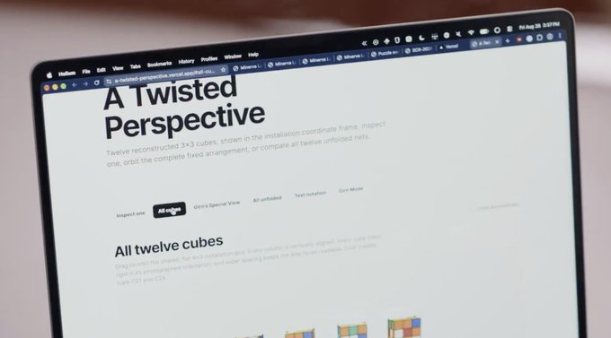 The image shows a laptop screen displaying a webpage titled "A Twisted Perspective" with text describing a 3×3 Rubik's cube installation. The post jokingly references this as being "in gpt 6 demo video," humorously mistaking the explanatory website content for an AI demo.
