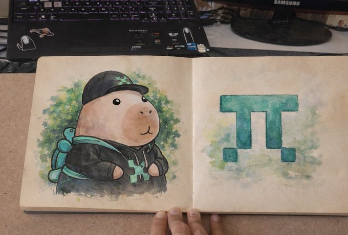 The image shows an open sketchbook with a watercolor painting of a cap-wearing capybara in a hoodie alongside a stylized teal "π" (pi) symbol, both set against green foliage backgrounds, with a Samsung monitor and keyboard visible above. The artwork appears unrelated to the post about Fermah's proof orchestration, instead serving as a creative, whimsical illustration that contrasts with the technical topic of decentralized proof generation.