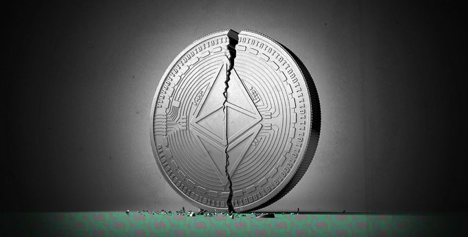 The image shows a coin that has been split into two halves, with one side intact while the other is completely shattered. The coin is placed against a black background, emphasizing its broken state. In relation to the accompanying text about Ethereum's market sentiment, the coin symbolizes the vulnerability of the cryptocurrency due to external factors such as market fluctuations and ETF outflows. This image conveys a sense of uncertainty and instability in the world of digital currencies, highlighting the importance of timely intervention by buyers to prevent the Ethereum price from falling below $2,000 or possibly lower.