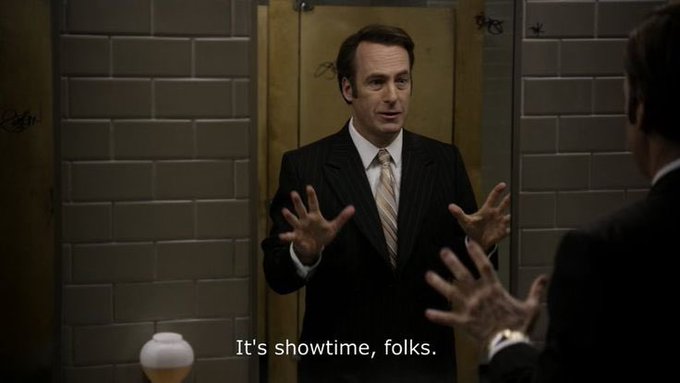 A man in a dark suit stands in front of a bathroom mirror with his hands raised, with the subtitle "It's showtime, folks." visible at the bottom of the image.

The dramatic mirror pose and "It's showtime" quote evoke a sense of grand preparation and confidence, which loosely echoes the post's determined tone about abandoning mints in favor of pursuing new collaborations—but there's no direct thematic connection between the two.