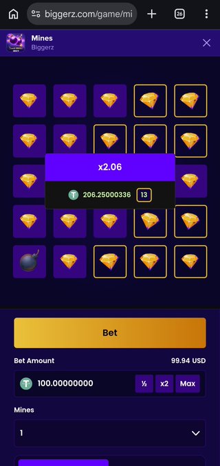 A screenshot of the 'Mines' game on biggerz.com showing a 5x5 grid of gems with one bomb, displaying a multiplier of x2.06, a bet amount of 99.94 USD, and balance information.
