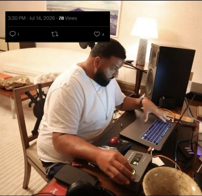 Photo of a bearded man in a white t-shirt working on a laptop at a desk with audio equipment, overlaid with a Twitter post timestamp '3:30 PM · Jul 14, 2026 · 78 Views'.