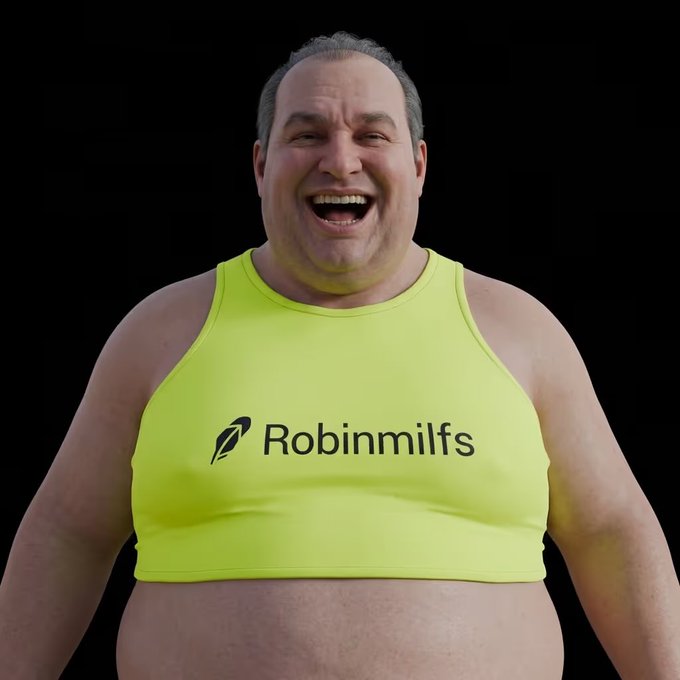 A laughing man wearing a yellow tank top with the text 'Robinmilfs' and a feather logo on it.