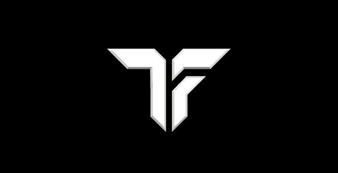 A stylized white geometric "M" logo on a black background, representing FirstTensor—a community-led initiative focused on Bittensor ($TAO) and GenesisL1, whose new website serves as the foundation for upcoming platform developments.