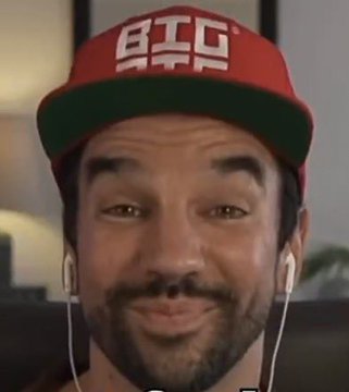 A man wearing a red "BIG BTC" cap and earbuds smiles at the camera, representing David Bailey, who the post accuses of being a "narrative control mechanism" and Wall Street's marketing arm to manufacture anti-Bitcoin maxi sentiment.