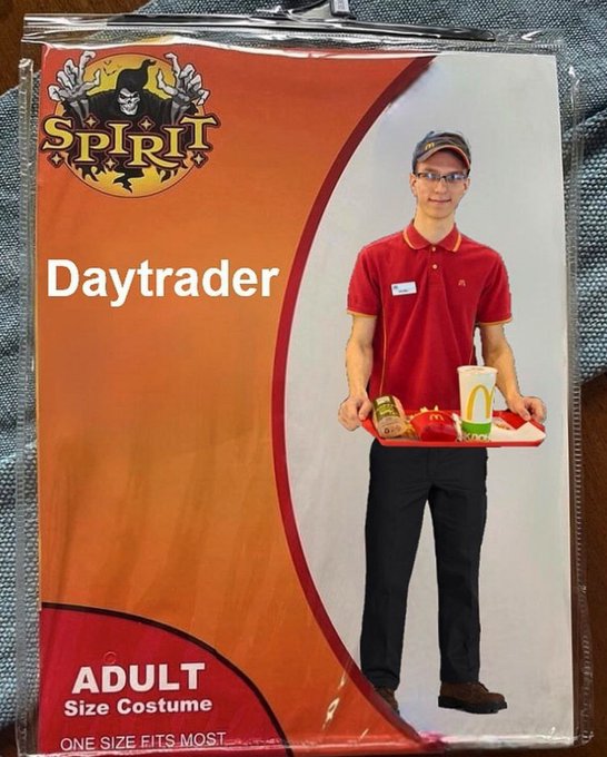 A packaged 'Spirit' brand Halloween costume labeled 'Daytrader' and 'Adult Size Costume, One Size Fits Most,' featuring a McDonald's-uniformed employee holding a McDonald's tray.
