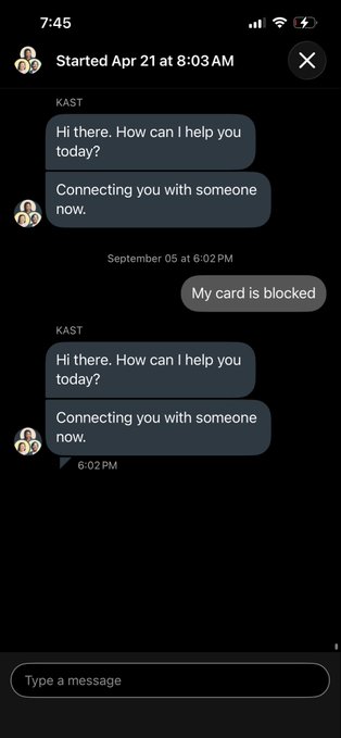 A screenshot of a KAST chat support conversation where a user reports 'My card is blocked' but receives only automated replies saying 'Hi there. How can I help you today?'