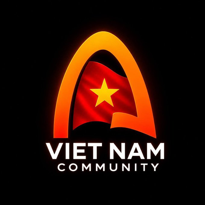 The image features a logo for an organization called "Viet Nam Community" with a red star and a Vietnamese flag, which are both orange and yellow colors. The logo is displayed against a black background, making it stand out prominently. Below the logo, there's text that reads "Chuẩn bị vào việc cùng này & tuần tới bùng nổ sức mạnh cùng @arc và @Arc_Vietnam nhé. Join kênh Social chính của ARC tại đây: X Arc Việt Nam Community". The combination of the logo and text creates a strong visual connection to the organization's name, making it easy for viewers to understand what the post is about.