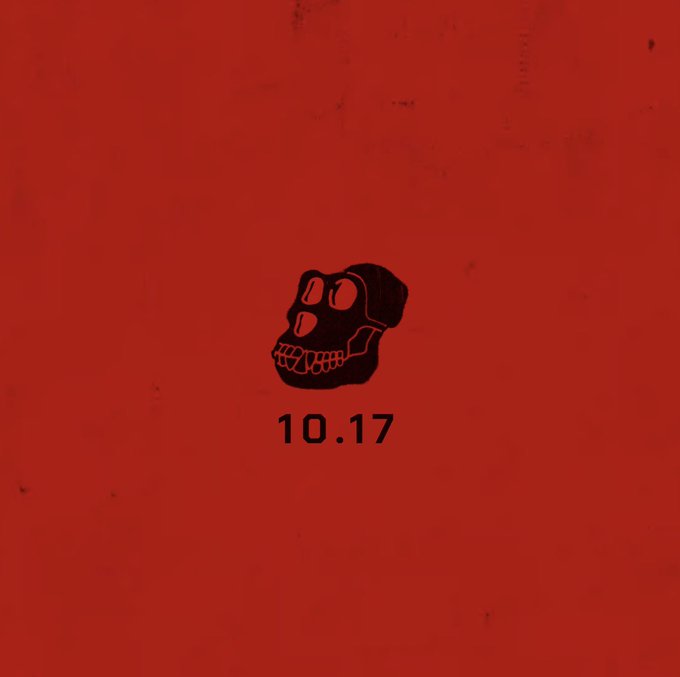 Minimalist red graphic featuring a black gorilla/skull logo with the date '10.17' printed below it, referencing Gorillaz's 'The Now Now' album cover style.