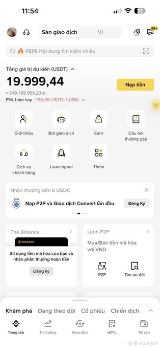 A screenshot of a cryptocurrency trading app in Vietnamese showing a total value of '19.999,44' USDT with navigation options for features like P2P trading and Launchpool.