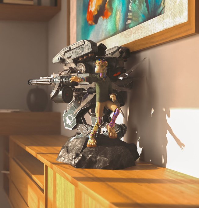A figurine of a monkey character wearing a military-style outfit, posed with a large futuristic machine gun weapon, displayed on a wooden surface.