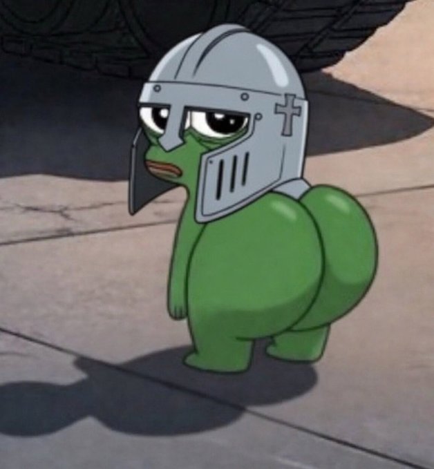 A small green cartoon frog-like character stands on a concrete surface wearing a gray medieval knight's helmet with a cross emblem, looking sad.