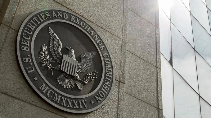 The official seal of the U.S. Securities and Exchange Commission mounted on a stone building facade, featuring an eagle and the Roman numerals MCMXXXIV (1934).