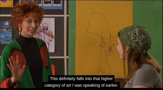 A red-haired woman in a green jacket smiles and gestures toward a large canvas displaying a chaotic, abstract wire sculpture, while a younger woman with a green bandana looks on, with the subtitle reading, "This definitely falls into that higher category of art I was speaking of earlier." The image satirizes the absurdity of art valuation—echoing the meme's joke that NFT collectors will praise anything once they learn it sold for a high price.