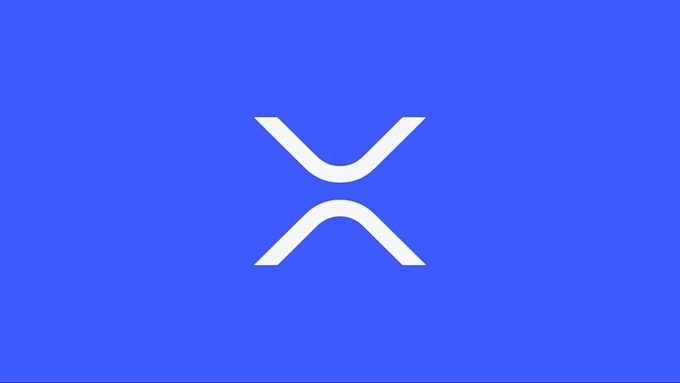 A blue logo screen displays a white crossed curved symbol resembling an X-shaped emblem.