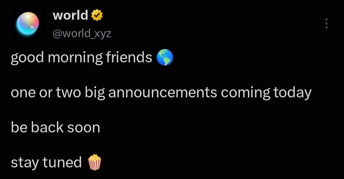 A screenshot of an X (formerly Twitter) post from the verified account 'world' (@world.xyz) reading: 'good morning friends 🌍 one or two big announcements coming today be back soon stay tuned 🍿'
