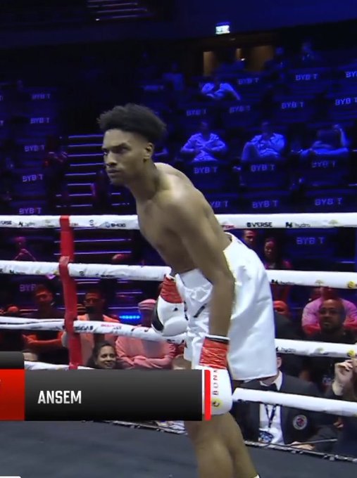 A shirtless boxer stands in the ring with red gloves, with the text "ANSEM" displayed on screen, visually referencing the meme comparing $ANSEM's market cap and holder count to other projects.