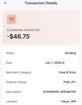 A mobile app transaction details screen showing a pending charge of -$46.75 (7540 JPY) at a merchant called 'SUSHIMARU SHIOMITEN' in Tokyo, JPN.