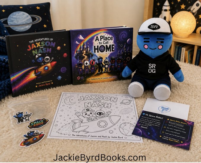 A promotional display for 'JackieByrdBooks.com' features two children's books 'The Adventures of Jaxson and Nash' and 'A Place to Call Home', alongside a plush toy wearing an 'SR OG' hoodie, a coloring page, stickers, and a 'Hi, Space Rider!' information card.