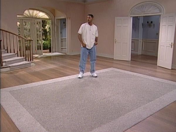 "Will Smith is left alone in an empty mansion, much like how investors are left with nothing when their cryptocurrency investments plummet to zero."