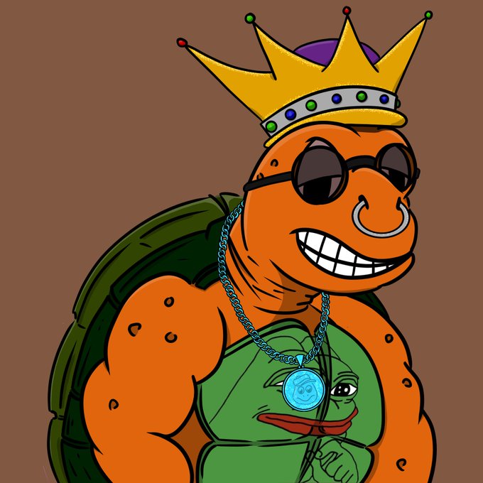 A cartoon illustration of a muscular orange turtle wearing a yellow crown with jewels, dark sunglasses, a nose ring, and a large blue medallion, grinning widely.