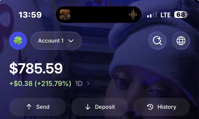 A mobile crypto wallet app screenshot displays an account balance of $785.59 with a daily gain of +$0.38 (+215.79%), showing Send, Deposit, and History options. The impressive balance reinforces the poster's caption claiming the wallet was empty earlier that morning, illustrating the volatile and potentially lucrative nature of web3.
