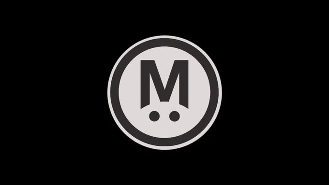 The image displays the MegaETH logo, featuring a bold "M" with two dots beneath it inside a circular black-and-white design. This matches the Ethereum scaling project mentioned in the post, which is shutting down its Mega Mafia accelerator program after two years.