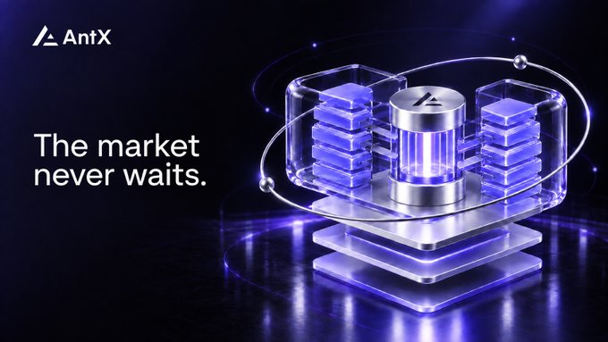 A promotional graphic for "AntX" featuring a metallic, futuristic 3D structure with blue glowing accents and orbital rings, accompanied by the text "The market never waits."