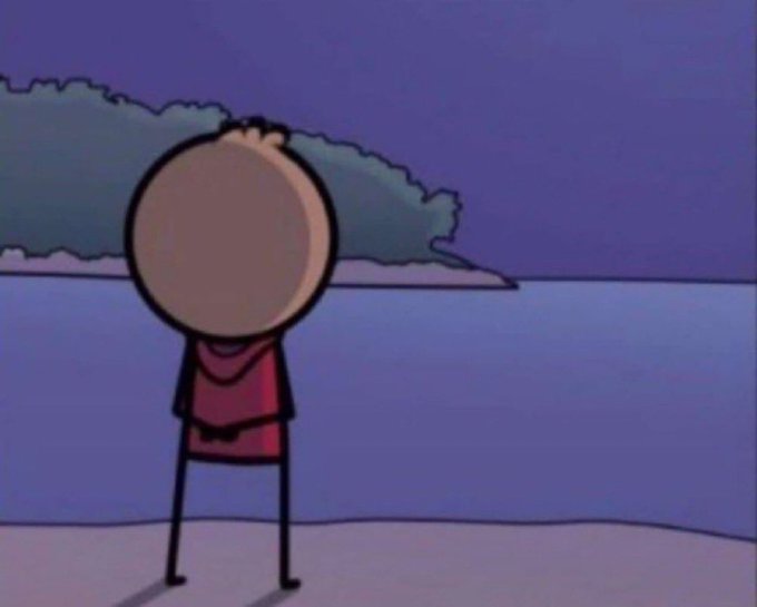 An animated cartoon character with a round beige head, wearing a red shirt, standing and looking out over purple-hued water toward a distant island.