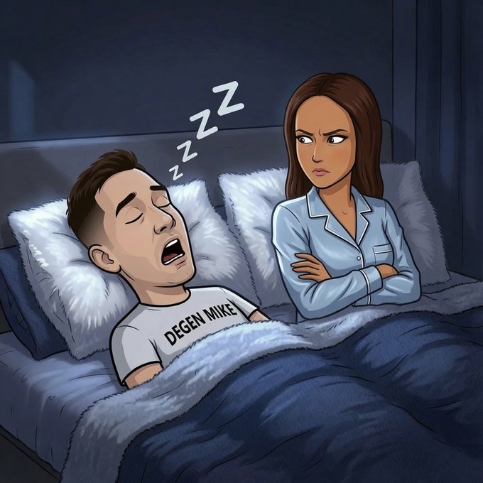 A cartoon couple in bed: a man in a “DEGEN MIKE” shirt sleeps while a displeased woman in blue pajamas sits beside him with her arms crossed.