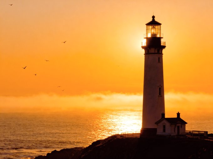 A silhouetted lighthouse stands against a glowing golden sunset over the ocean, with birds gliding through the hazy sky and its beacon glowing warmly at the top. The scene's solitary watchtower overlooking the horizon mirrors the "Horizon Sentinel" title, evoking themes of guidance and stillness often captured in Tezos NFT artwork.