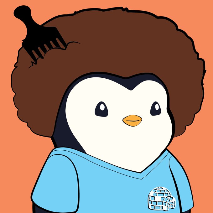 A cartoon penguin character with a brown afro hairstyle, a comb stuck in its hair, wearing a light blue shirt with a 'Yo' logo on an orange background.
