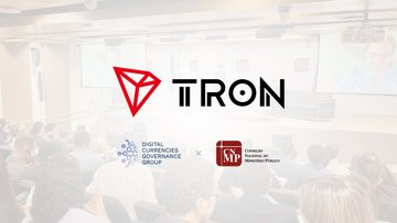 A presentation slide displaying the TRON logo along with logos for the Digital Currency Governance Consortium (DCG3) and Stanford Digital Finance Education Initiative, set against a blurred background of a conference audience.