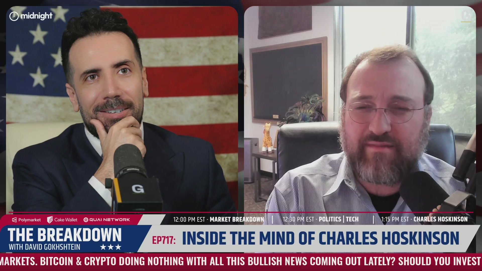 The image shows two men sitting at a table, one wearing a suit and the other wearing glasses. They are both talking into microphones during an interview or discussion. The background of the image features an American flag, which suggests that this could be taking place in the United States. The text "Inside the Mind of Charles Hockinson" is also present in the image.